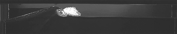 breaking wave in SIO hydro lab glass channel